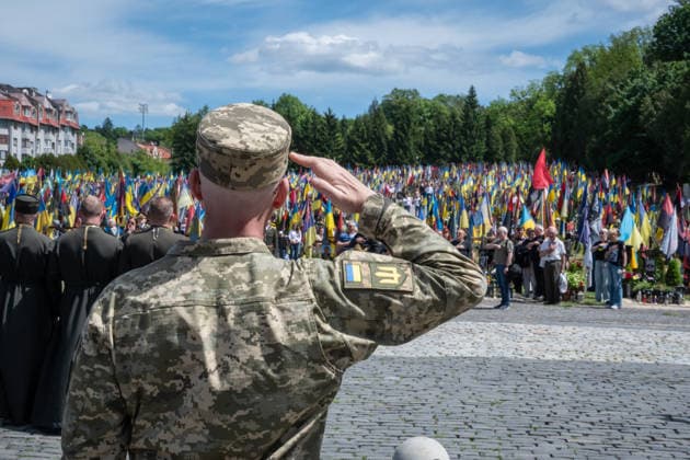 Commemoration procession held on Heroes Day in Lviv, Ukraine LVIV, UKRAINE, MAY 23: Military and civilians take part in a ceremony to honor the memory of fallen servicemen at the honorary burial grounds at the Lychakiv Cemetery during the Day of Heroes of Ukraine in Lviv, Ukraine, May 23, 2026. Also on this day, military personnel, police, members of youth organizations and civilians marched through the city in a solemn procession dedicated to all participants of the ATO JFO, war veterans and participants who died or are fighting for the freedom of Ukraine. Olena Znak Anadolu Lviv Ukraine. Editorial use only. Please get in touch for any other usage. Copyright: x2026xAnadoluxOlenaxZnakx