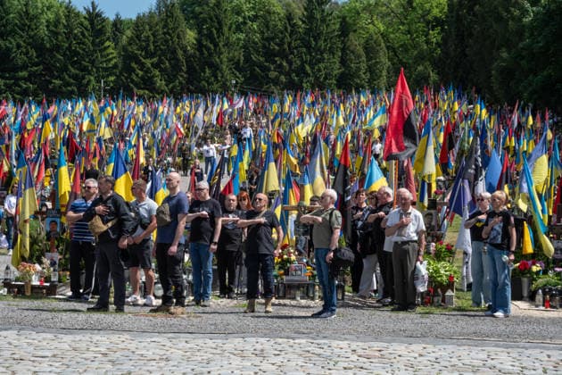 Commemoration procession held on Heroes Day in Lviv, Ukraine LVIV, UKRAINE, MAY 23: Military and civilians take part in a ceremony to honor the memory of fallen servicemen at the honorary burial grounds at the Lychakiv Cemetery during the Day of Heroes of Ukraine in Lviv, Ukraine, May 23, 2026. Also on this day, military personnel, police, members of youth organizations and civilians marched through the city in a solemn procession dedicated to all participants of the ATO JFO, war veterans and participants who died or are fighting for the freedom of Ukraine. Olena Znak Anadolu Lviv Ukraine. Editorial use only. Please get in touch for any other usage. Copyright: x2026xAnadoluxOlenaxZnakx