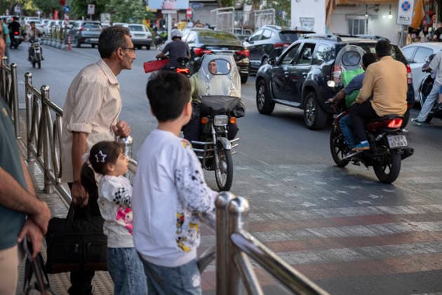 Daily Life In Iran Amid Threat About New Possible War Motorcyclists ride over U.S. and Israeli flags in a business district in downtown Tehran, Iran, on May 22, 2026. U.S. President Donald Trump has threatened Iran with the possibility of a new conflict, and according to official reports, he is considering military action if no agreement is reached with Iranian officials. Tehran Tehran Iran  Copyright: xMortezaxNikoubazlx originalFilename: nikoubazl-dailylif260522_npDyX