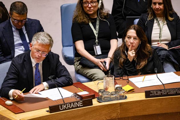 May 23, 2026, New York, New York, USA: (L to R) ANDRII MELNYK, Permanent Representative of Ukraine to the UN looks over notes as VANESSA FRAZIER, Special Representative of the Secretary-General for Children and Armed Conflict, sits next to him during an emergency UN Security Council meeting on Ukraine at UNHQ following Russian allegations of a Ukrainian drone strike on a vocational school and student dormitory in Russian-controlled Luhansk, which Ukraine denies targeted civilians. New York USA  - ZUMAo116 20260523_znp_o116_014 Copyright: xBiancaxOterox