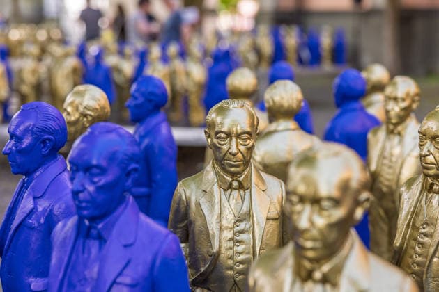 Adenauer art installation in Bad Honnef 23 05 26 Art installation by artist Ottmar Hörl with 200 gold and blue sculptures of the first Federal Chancellor Konrad Adenauer on the church square in Bad Honnef The presentat Copyright: xMarcxJohnx