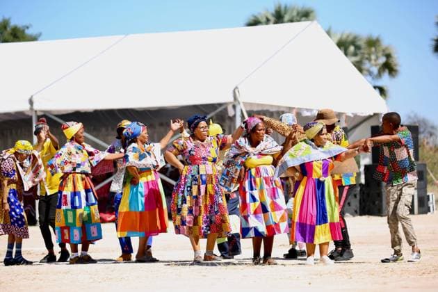 (260524) -- OMUSATI, May 24, 2026 -- People perform during the 16th annual Omagongo Festival at Onamega Village, Omusati region, Namibia, May 23, 2026. Namibia on Saturday celebrated the 16th annual Omagongo Festival at Onamega village under the Uukwambi Traditional Authority in the country s northern Omusati Region, highlighting the enduring role of culture in fostering unity, identity and social cohesion. TO GO WITH Namibia celebrates unity, heritage at 16th Omagongo Festival (Photo by Xinhua) NAMIBIA-OMUSATI-OMAGONGO FESTIVAL NdalimpingaxIita 