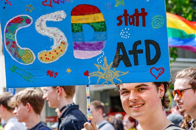 CSD Hannover 2026 motto We write the future Equal rights Self-determined Queer participant with sign CSD instead of AfD Hannover Georgsstraße Lower Saxony, Hannover region Germany