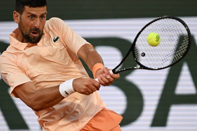French Open (Roland Garros) - Day 1 PARIS, FRANCE - MAY 24: Serbia s Novak Djokovic in action against France s Giovanni Mpetshi Perricard (not seen) during a first-round men s singles match on the opening day of the French Open (Roland Garros) in Paris, France, on May 24, 2026. Burak Akbulut Anadolu Paris France. Editorial use only. Please get in touch for any other usage.  Copyright: x2026xAnadoluxBurakxAkbulutx