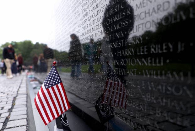 May 24, 2026, Washington, District Of Columbia, USA: Visitors are reflected at the Vietnam Veterans Memorial following the Rolling to Remember ride over Memorial Day weekend in Washington, DC, USA, on May 24, 2026. The Rolling to Remember tradition has been active for 38 years, honouring fallen service members, prisoners of war, and those still missing in action during Memorial Day weekend. Washington USA - ZUMAs337 20260524_znp_s337_044 Copyright: xGentxShkullakux