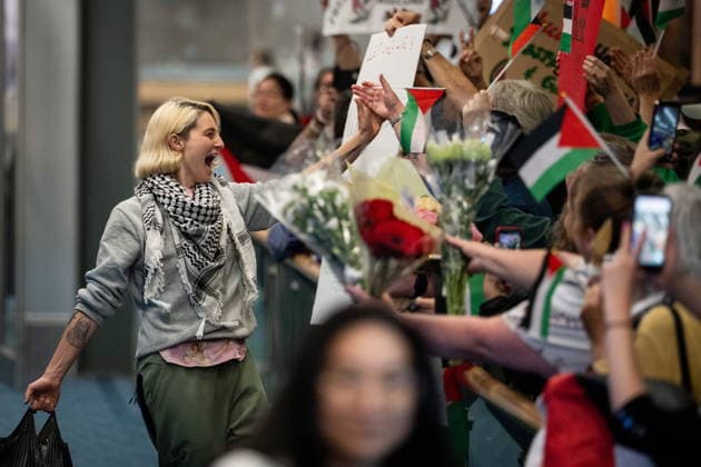 May 24, 2026, Vancouver, Bc, CANADA: Mary Grace Mathisen, member of the Gaza flotilla runs to friends and family as she arrives at the Vancouver International Airport in Richmond B.C., on Sunday, May 24, 2026. Vancouver CANADA  - ZUMAc35_ 20260524_zaf_c35_146 Copyright: xEthanxCairnsx