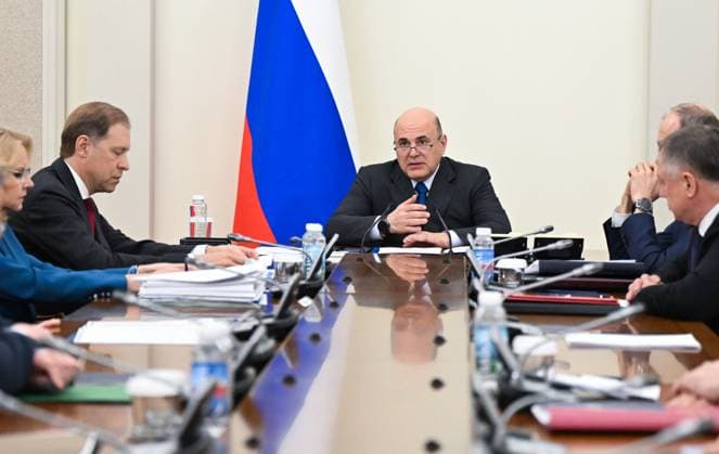 Russia Mishustin Deputies 9173049 25.05.2026 Russian Prime Minister Mikhail Mishustin chairs a meeting with his deputies, as First Deputy Prime Minister Denis Manturov sits nearby, in Moscow, Russia. Alexander Miridonov Sputnik Moscow Russia  Copyright: xAlexanderxMiridonovx