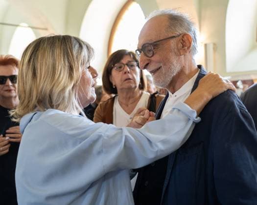 May 24, 2026, Pollenzo, Cn, Italy: Funeral ceremony for Carlo Petrini, founder of Slow Food, the Terra Madre food fair, and the University of Pollenzo. In the photo, Petrini s friends greet each other with an embrace. Pollenzo, May 24, 2026 Pollenzo Italy - ZUMAa289 20260524_zia_a289_044 Copyright: xSelenexDanielex xAgfx