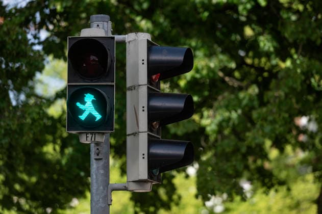 Lübeck Schleswig-Holstein Germany May 2026 Ampelmännchen on a traffic crossing in the centre of the city. Ampelmannchen, man, crossing, east german, ddr, ostalgia, Ampelmann, safety, road,green, grüne,
