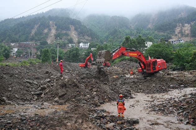 CHONGQING, CHINA - MAY 25: Rescuers carry out search and rescue work at the disaster-hit area after a heavy rainstorm hit Yongchuan District on May 25, 2026 in Chongqing, China. Record-breaking torrential rain battered Yongchuan District in southwest China s Chongqing Municipality from late May 23 to May 24, triggering flash floods, landslides and mudslides. Rescue operations are still underway as multiple towns and subdistricts suffered severe damage.  Copyright: xChinaxNewsxServicex 111643998134