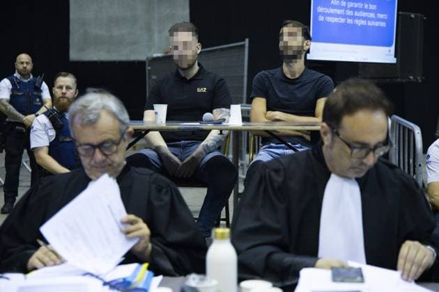 Lawyer Frank Discepoli, defending P. Falzone, Accused Paolo Falzone, Accused Antonino Falzone and Lawyer Fabrice Guttadauria, defending A. Falzone pictured during the trial of P. and A. Falzone, at the Court of Appeal of Mons, on Wednesday 27 May 2026. The trial of the two men concerns the 2022 tragedy in Strepy-Bracquegnies, where a car plowed into a carnival parade around 5:00. Six people died at the scene, and a seventh months later in the hospital. P. Falzone is charged with seven murder and 81 attempted murder. A. Falzone with failure to render aid to a person in danger. The trial is in its fourth week  NICOLASxMAETERLINCK 175149198