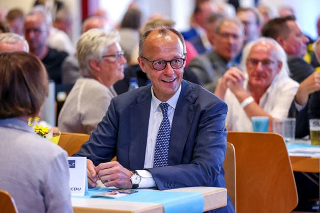 27 05 2026, Politics, Federal Chancellor Friedrich Merz CDU as guest speaker at the ceremony in the Schützenhalle Hüsten near Arnsberg 80 years of Neheim Hüstener program North Rhine-Westphalia Germany