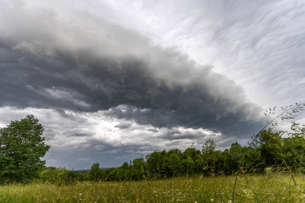Thunderstorm in Bavaria A gust front of a thunderstorm moves up in the sky in the morning, Hösbach Bavaria Germany