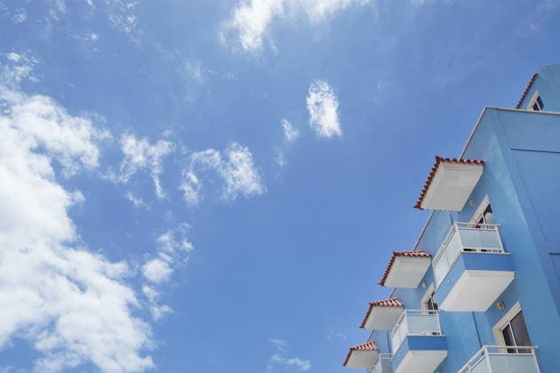 Subject Sun, Beach and Sea, Modern Hotel and Fair weather clouds from the Subview as Symbol image for Summer holiday on Sea, Beach vacation, All Included Vacation, Z B Canary Islands, Mediterranean islands 1131609794