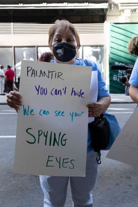 June 3, 2026, New York, New York, USA: During Palantir TechnologiesÃ¢â‚¬â ¢ Annual Meeting of Stockholders immigration advocates, family members of those deported and detained, faith leaders, union members and allies rally outside the tech company s office in Manhattan s Chelsea neighborhood denouncing PalantirÃ¢â‚¬â ¢s partnership with U.S. Immigration and Customs Enforcement (ICE) and the US Department of Defense and its role providing software aiding President Trump s mass deportation agenda. A protester holds a sign that reads PALANTIR You can t hide We can see your SPYING EYES. Attendees stand in support of the Congregation of the Sisters of St. Joseph of Peace who put forth Shareholder Proposal 5 during the Annual General Meeting, c - ZUMAr174 20260603_znp_r174_001 Copyright: xGinaxMxRandazzox