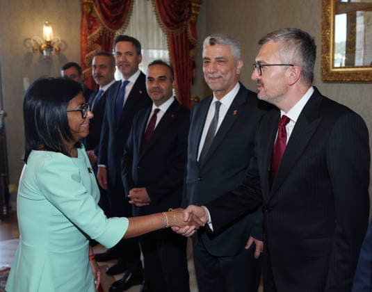Turkish President Erdogan meets Venezuelan Interim President Delcy Rodriguez in Istanbul ISTANBUL, TURKIYE - JUNE 8: (----EDITORIAL USE ONLY - MANDATORY CREDIT - TURKISH PRESIDENCY MUSTAFA KAMACI HANDOUT - NO MARKETING NO ADVERTISING CAMPAIGNS - DISTRIBUTED AS A SERVICE TO CLIENTS----) Venezuelan Interim President Delcy Rodriguez shakes hands with Presidential Communications Director Burhanettin Duran (R) alongside Minister of Trade Omer Bolat (2nd R), Minister of Industry and Technology Mehmet Fatih Kacir (3rd R), Minister of Energy and Natural Resources Alparslan Bayraktar (4th R), Turkish Vice President Cevdet Yilmaz (6th R) and Foreign Minister Hakan Fidan (5th R) during a meeting at the Presidential Dolmabahce Office in Istanbul  Copyright: x2026xAnadoluxTURxPresidencyx xMustafaxKamacix