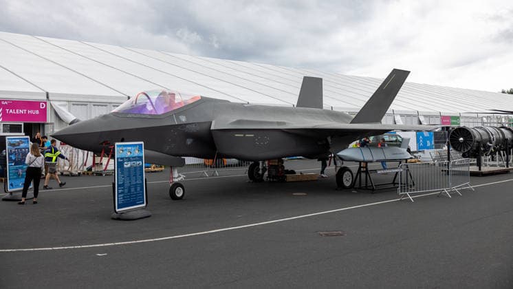 Press tour at the ILA Berlin 2026, Berlin, 09 06 2026 A Lockheed Martin F 35 Lightning II stealth fighter jet stands as an exhibit on the open-air grounds Next to the aircraft, a guided missile is on display as a Joint Air to Surface Standoff Missile Schönefeld Selchow Brandenburg Germany 20260609-286A8711-M4000