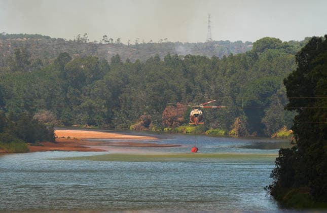 Declared the emergency phase, operational situation 1, by a fire in Villanueva de los Castillejos Huelva An Infoca helicopter working in the area of the bridge of the river Odiel, in the term of Gibraleón Huelva , within the work of extinguishing the fire that originated on Monday in a place of Villanueva de los Castillejos A June 9, 2026 in San Bartolomé de la Torre , Huelva Andalusia, Spain A total of 22 aerial means will be incorporated gradually this Tuesday, June 9 to the work of extinguishing the fire declared at 13,15 hours this Monday in the area of Los Turbios de Villanueva de los Castillejos Huelva and has mainly affected San Bartolomé de la Torre The Minister of Health, Presidency and Emergencies, Antonio Sanz, said that this is  Copyright: xMariaxJosÃ xLopezx 7584507