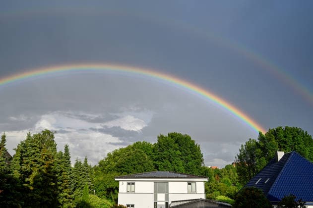 Germany, Schleswig Holstein, Wedel, 09 06 2026 After a heavy downpour a double rainbow appears over Wedel Schleswig Holstein Rainbow over Wedel