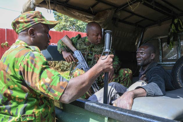Protest held in Kenya against planned U.S. Ebola quarantine facility NANYUKI, KENYA - JUNE 09: Kenyan police detain a protester during a demonstration against a planned Ebola quarantine facility for U.S. citizens in Nanyuki, central Kenya on June 09, 2026. Dozens of people gathered to protest the facility, blocking a road and setting fires before police intervened to disperse the crowd. Lucas Mukasa Anadolu Nanyuki Kenya. Editorial use only. Please get in touch for any other usage.  Copyright: x2026xAnadoluxLucasxMukasax