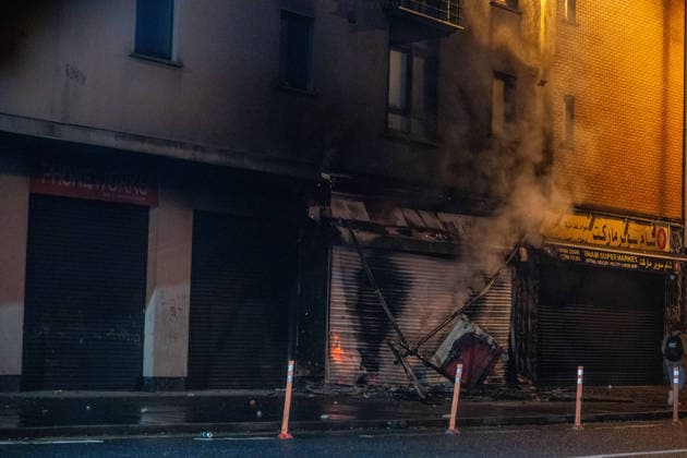 June 9, 2026, Belfast, Antrim, United Kingdom: A burnt out shop that is owned by an immigrant seen after an anti-immigration protest. Belfast erupted into flames as locals took to the streets to protest against the stabbing of a North Belfast man by a Sudanese national refugee. Road blockades were set up all over Belfast bringing much of the city to a standstill. The protestors are demanding a stop to immigration into Northern Ireland. Belfast United Kingdom  - ZUMAs197 20260609_aaa_s197_272 Copyright: xLabxMox