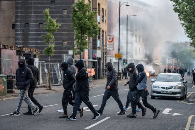 June 9, 2026, Belfast, Antrim, United Kingdom: Belfast youths burn down a grocery store owned by an immigrant. Belfast erupted into flames as locals took to the streets to protest against the stabbing of a North Belfast man by a Sudanese national refugee. Road blockades were set up all over Belfast bringing much of the city to a standstill. The protestors are demanding a stop to immigration into Northern Ireland. Belfast United Kingdom  - ZUMAs197 20260609_aaa_s197_279 Copyright: xLabxMox
