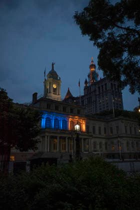 June 10, 2026, New York, New York, USA: As game 4 of the Knicks vs. Spurs NBA finals is played in New York City, City Hall and The David N. Dinkins Manhattan Municipal Building in Manhattan s Civic Center are lit up in blue and orange in support of the New York Knicks. New York USA  - ZUMAr174 20260610_znp_r174_006 Copyright: xGinaxMxRandazzox