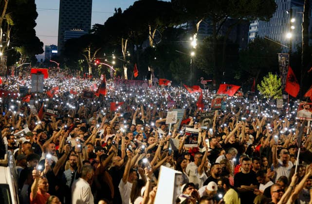 Protest against the construction of a luxury resort in Tirana, Albania. Protesters hold signs and Albanian national flags as they take part in a demonstration in front of the prime minister s office in Tirana on June 10, 2026, opposing the construction of a luxury resort in a protected natural area near the city of Vlore. Several thousand citizens demonstrated in Tirana for the ninth consecutive night to demand transparency on a luxury tourism complex project in the protected area of Narta Lagoon in the city of Vlore linked to US President Donald Trump s son-in-law Jared Kushner and his wife, Ivanka Trump. The project was planned for two areas along the Adriatic coast, the protected delta area of Vjosa-Narta and the nearby uninhabited islan Copyright: xLightxStudioxAgencyx xMaltonxDibrax