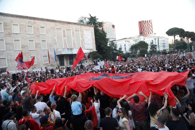 Protest against the construction of a luxury resort in Tirana, Albania. Protesters hold signs and Albanian national flags as they take part in a demonstration in front of the prime minister s office in Tirana on June 10, 2026, opposing the construction of a luxury resort in a protected natural area near the city of Vlore. Several thousand citizens demonstrated in Tirana for the ninth consecutive night to demand transparency on a luxury tourism complex project in the protected area of Narta Lagoon in the city of Vlore linked to US President Donald Trump s son-in-law Jared Kushner and his wife, Ivanka Trump. The project was planned for two areas along the Adriatic coast, the protected delta area of Vjosa-Narta and the nearby uninhabited islan Copyright: xLightxStudioxAgencyx xMaltonxDibrax
