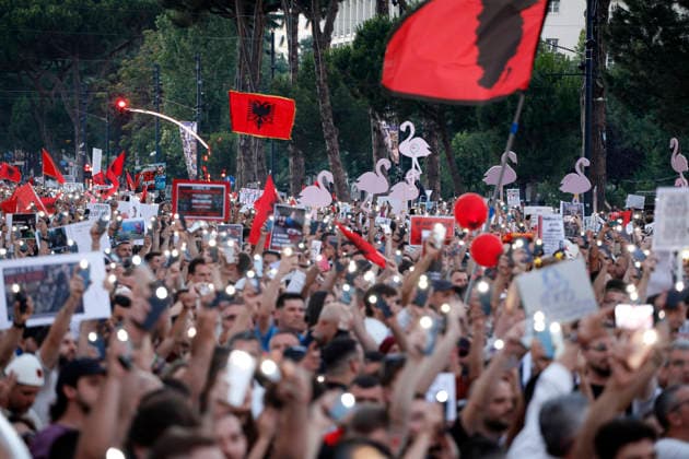 Protest against the construction of a luxury resort in Tirana, Albania. Protesters hold signs and Albanian national flags as they take part in a demonstration in front of the prime minister s office in Tirana on June 10, 2026, opposing the construction of a luxury resort in a protected natural area near the city of Vlore. Several thousand citizens demonstrated in Tirana for the ninth consecutive night to demand transparency on a luxury tourism complex project in the protected area of Narta Lagoon in the city of Vlore linked to US President Donald Trump s son-in-law Jared Kushner and his wife, Ivanka Trump. The project was planned for two areas along the Adriatic coast, the protected delta area of Vjosa-Narta and the nearby uninhabited islan Copyright: xLightxStudioxAgencyx xMaltonxDibrax