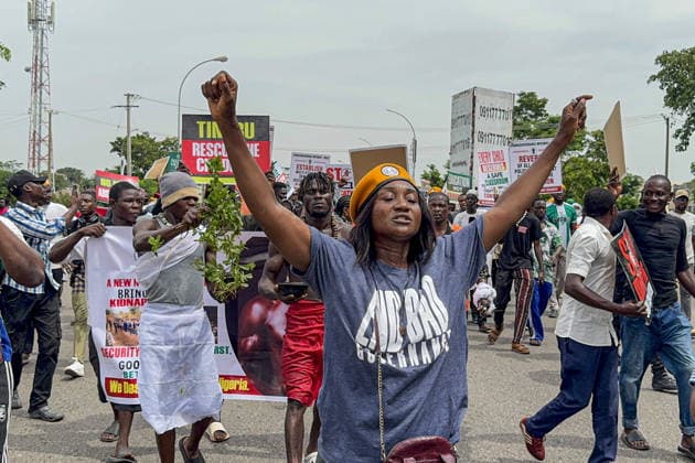 Protesters rally against security and economic challenges on Nigeria s Democracy Day ABUJA, NIGERIA - JUNE 12: Protesters gather during a demonstration marking Democracy Day, voicing concerns over worsening security and economic challenges in Abuja, Nigeria, on June 12, 2026. Demonstrators chanted anti-government slogans and carried banners highlighting growing insecurity, mass abductions of students from schools and ongoing economic hardships. Adam Abu-bashal Anadolu Abuja Nigeria. Editorial use only. Please get in touch for any other usage.  Copyright: x2026xAnadoluxAdamxAbu-bashalx
