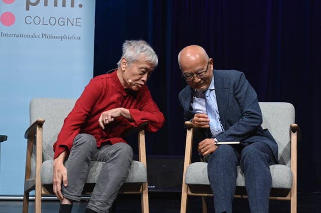 Translator Shi Ming and political scientist Wu Guoguang, l r, speaks at Phil Cologne, an international festival of philosophy on the topic of China as a great power - Wu Guoguang on Xi Jinpings global politics