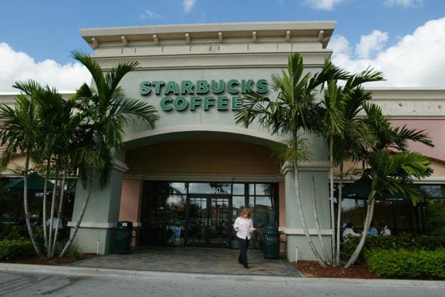 Aggressive Growth Plan Oct 29, 2006; West Palm Beach, FL, USA; Starbucks located at the Wellington Green mall. Starbucks aggressive growth plan hinges on what the company calls ÒinfillÓ Ñ adding stores in cities where its mermaid logo is already commonplace. In many cases, that means a Starbucks within a block of an existing store, if not closer. Iaboni said that she buys from this starbucks when she is alone, but visits the one inside Barnes and Noble, just a block away, when her kids are with her. There is nothing for them to do here, over there I send them to the kids section to pick out books, Iaboni said. Mandatory Credit: Photo by Brian Lehmann Palm Beach Post ZUMA Press. ( ) Copyright 2006 by Palm Beach Post West Palm Beach FL Copyright: xBrianxLehmannx