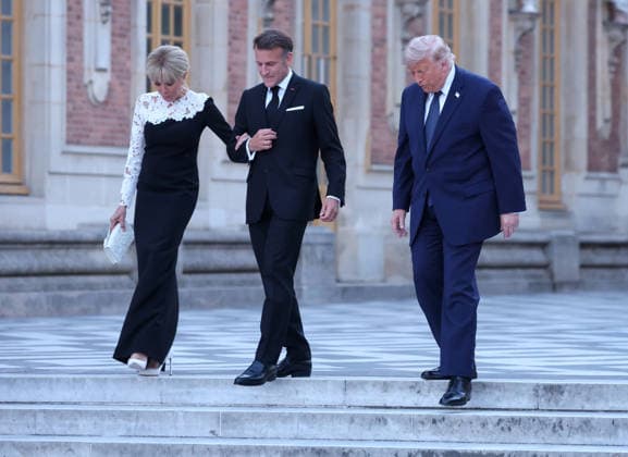 French President Emmanuel Macron and his wife, Brigitte, welcome US President Donald Trump to Versailles, outside Paris, France, on Wednesday, June 17, 2026. Trump was invited at the palace for dinner in the follow-up of the G7 summit in Evian. PAR202406082120 MAYAxVIDON-WHITE