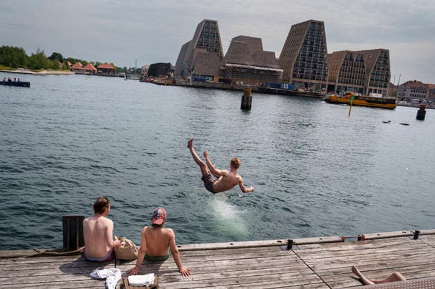 DENMARK WEATHER Summer is over in Denmark. Summer at Ofelia Plads in Copenhagen on Friday, June 19, 2026. Temperatures on Friday and Saturday are expected to be around 27–28 degrees, according to the DMI. Photo by Liselotte Sabroe, Ritzau Scanpix, Copenhagen, Denmark,detected_source_language  Copyright: Ritzau Scanpix LiselottexSabroex spdk20260619-140214-L