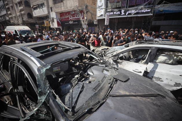 Palestinians Inspect Damaged Vehicles At The Site Of An Israeli Strike Palestinians inspect damaged vehicles at the site of an Israeli military operation in Gaza City, on June 22, 2026. Gaza Palestine  Copyright: xMajdixFathix originalFilename: fathi-notitle260622_npoKR