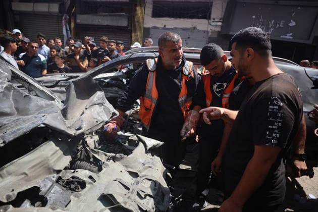 Palestinians Inspect Damaged Vehicles At The Site Of An Israeli Strike Palestinians inspect damaged vehicles at the site of an Israeli military operation in Gaza City, on June 22, 2026. Gaza Palestine  Copyright: xMajdixFathix originalFilename: fathi-notitle260622_npaoi