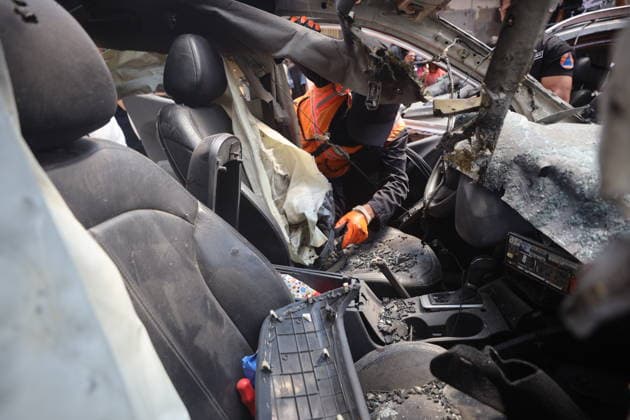 Palestinians Inspect Damaged Vehicles At The Site Of An Israeli Strike Palestinians inspect damaged vehicles at the site of an Israeli military operation in Gaza City, on June 22, 2026. Gaza Palestine  Copyright: xMajdixFathix originalFilename: fathi-notitle260622_npfgA