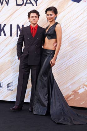 Tom Holland and Zendaya at the fan event for SPIDER-MAN