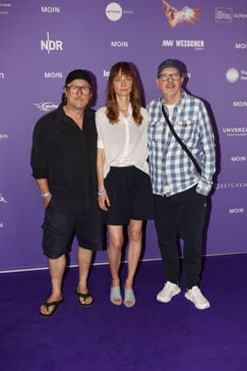 Bjarne Maedel, Katharina Marie Schubert, and Olli Dittrich at the Moin Mittsommer event hosted by the Film Fund of Hamburg and Schleswig-Holstein on June 23, 2026, in Hamburg. Bjarne Maedel, Katharina Marie Schubert, and Olli Dittrich attend the Moin Mittsommer event at Kampnagel on June 23, 2026, in Hamburg, Germany. Moin Mittsommer Event in Hamburg,detected_source_language