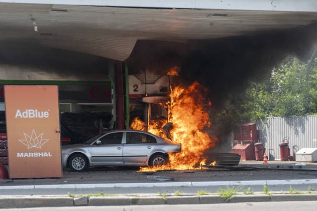 Aftermath of Russian UAV strike in Kharkiv KHARKIV, UKRAINE - JULY 3: Flames rise from a car and a fuel dispenser following UAV attack by Russia on a gas station near the city center of Kharkiv, Ukraine on July 03, 2026. There were no fatalities in the attack. Serhii Masin Anadolu Kharkivs ka Oblast Ukraine. Editorial use only. Please get in touch for any other usage.  Copyright: x2026xAnadoluxSerhiixMasinx