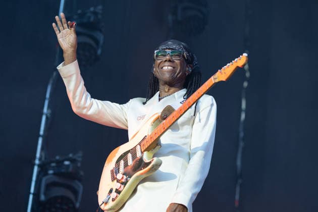 Nile Rodgers and Chic at the Kunst Rasen in Bonn: Guitarist and producer Nile RODGERS with his funk and disco band Chic performing live at the open-air concert at the Kunst Rasen in Bonn-Gronau. The summer concert series Kunst Rasen takes place on the edge of the Rheinaue on the banks of the Rhine in Bonn-Gronau, North Rhine-WestGermany Copyright: xMarcxJohnx