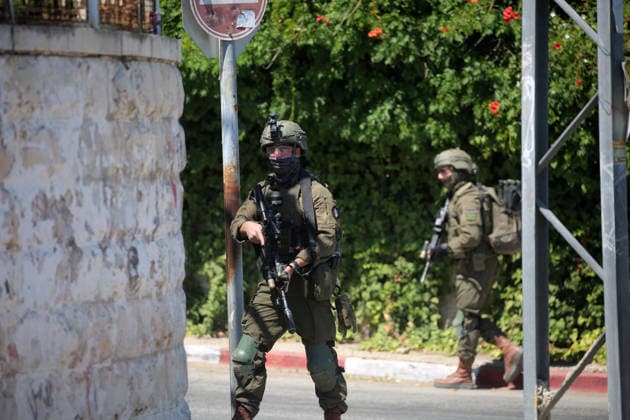 Israeli forces deploy during military operation in Nablus Israeli military vehicles and soldiers are deployed in the streets during a military operation targeting the West Bank city of Nablus, on July 12, 2026. Israeli forces raided several neighborhoods in the western part of the city during the operation. Photo by Mohammed Nasser apaimages Nablus West Bank Palestinian Territory 120726_Nablus_MN_00(13) Copyright: xapaimagesxMohammedxNasserx xapaimagesx