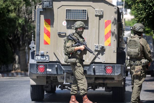 Israeli forces deploy during military operation in Nablus Israeli military vehicles and soldiers are deployed in the streets during a military operation targeting the West Bank city of Nablus, on July 12, 2026. Israeli forces raided several neighborhoods in the western part of the city during the operation. Photo by Mohammed Nasser apaimages Nablus West Bank Palestinian Territory 120726_Nablus_MN_00(15) Copyright: xapaimagesxMohammedxNasserx xapaimagesx