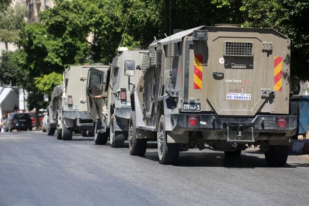 Israeli forces deploy during military operation in Nablus Israeli military vehicles and soldiers are deployed in the streets during a military operation targeting the West Bank city of Nablus, on July 12, 2026. Israeli forces raided several neighborhoods in the western part of the city during the operation. Photo by Mohammed Nasser apaimages Nablus West Bank Palestinian Territory 120726_Nablus_MN_00(16) Copyright: xapaimagesxMohammedxNasserx xapaimagesx