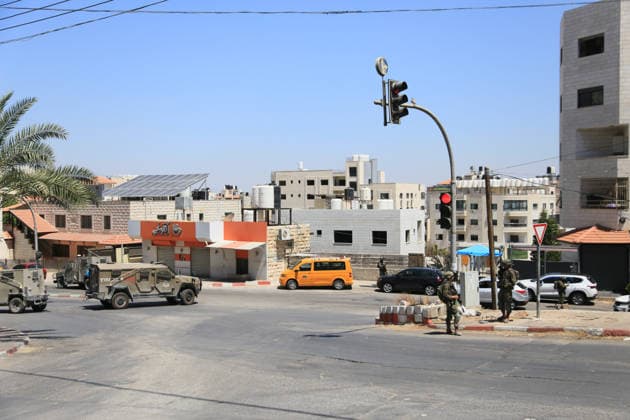 Israeli forces deploy during military operation in Nablus Israeli military vehicles and soldiers are deployed in the streets during a military operation targeting the West Bank city of Nablus, on July 12, 2026. Israeli forces raided several neighborhoods in the western part of the city during the operation. Photo by Mohammed Nasser apaimages Nablus West Bank Palestinian Territory 120726_Nablus_MN_00(8) Copyright: xapaimagesxMohammedxNasserx xapaimagesx