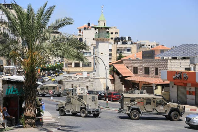 Israeli forces deploy during military operation in Nablus Israeli military vehicles and soldiers are deployed in the streets during a military operation targeting the West Bank city of Nablus, on July 12, 2026. Israeli forces raided several neighborhoods in the western part of the city during the operation. Photo by Mohammed Nasser apaimages Nablus West Bank Palestinian Territory 120726_Nablus_MN_00(9) Copyright: xapaimagesxMohammedxNasserx xapaimagesx