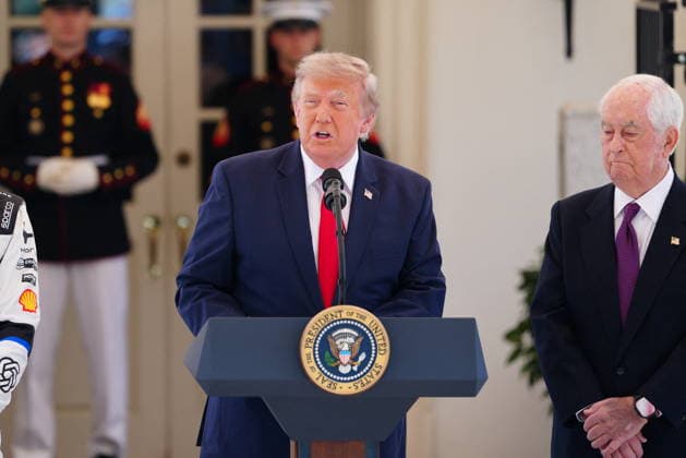 United States President Donald J Trump makes remarks as he hosts top IndyCar drivers at the White House in Washington, DC, USA, to promote the inaugural Freedom 250 Grand Prix on Monday, July 13, 2026. The race will be held in DC on August 22-23, 2026. Looking on from right is IndyCar series owner Roger Penske. Credit: CNP AdMedia Washington District of Columbia United States of America EDITORIAL USE ONLY  Copyright: xx AdMediax admphotosthree005104