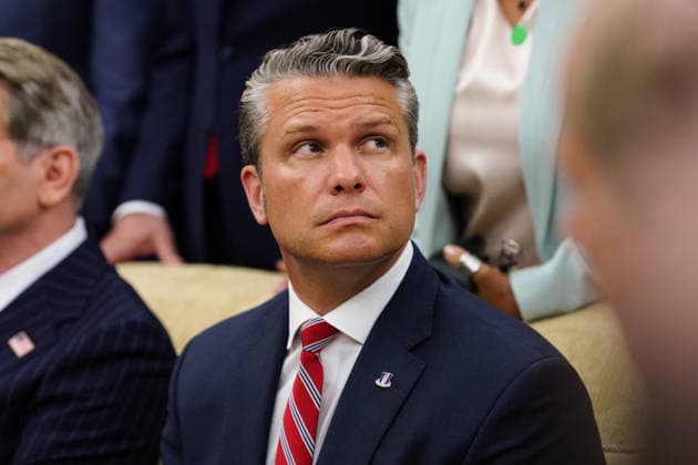 United States Secretary of War Pete Hegseth listens as US President Donald J Trump meets President Joseph Aoun of the Republic of Lebanon in the Oval Office of the White House in Washington, DC, USA, on Tuesday, July 21, 2026. Aoun is in Washington to present a proposal designed to disarm the Iran-backed militant group Hezbollah and secure Israel s withdrawal from Lebanon. Copyright: xAaronxSchwartzx xPoolxviaxCNPx MediaPunchx