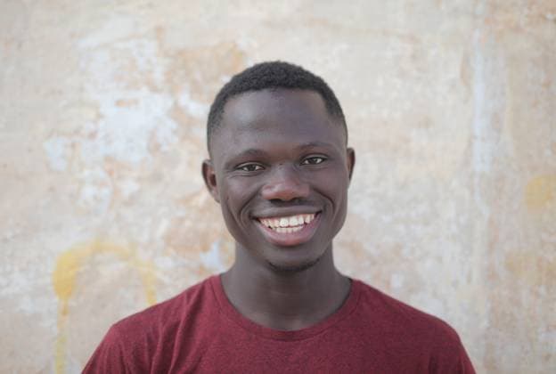Happy young African man smiling at camera Mellie?a, Northern Region, Malta R_MIPI26072288-2085456-01 ,model released, Symbolfoto ,property released